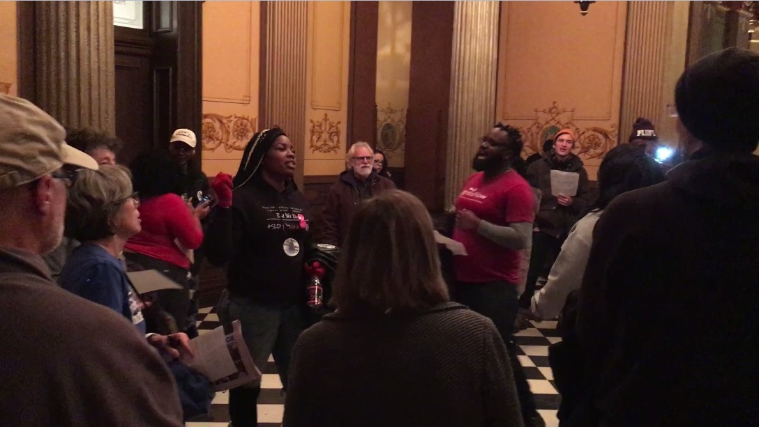 Chanting protestors in the Capitol Building